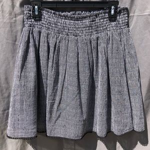 Black and white striped medium length flowy skirt